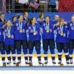 GANGNEUNG, SOUTH KOREA - FEBRUARY 22: USA players celebrating with their medals during the national anthem following a 3-2 shoot-out win against Canada in the gold medal game at the PyeongChang 2018 Olympic Winter Games. (Photo by Andre Ringuette/HHOF-IIHF Images)


